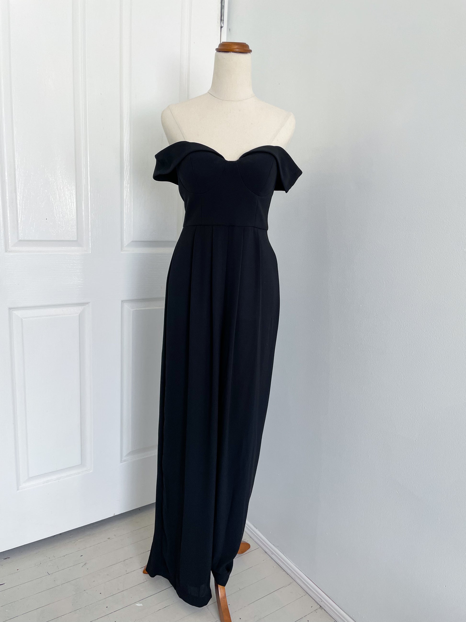 Sheike one piece pant suit or jumpsuit with off the shoulder detail and sheer see through legs, in black