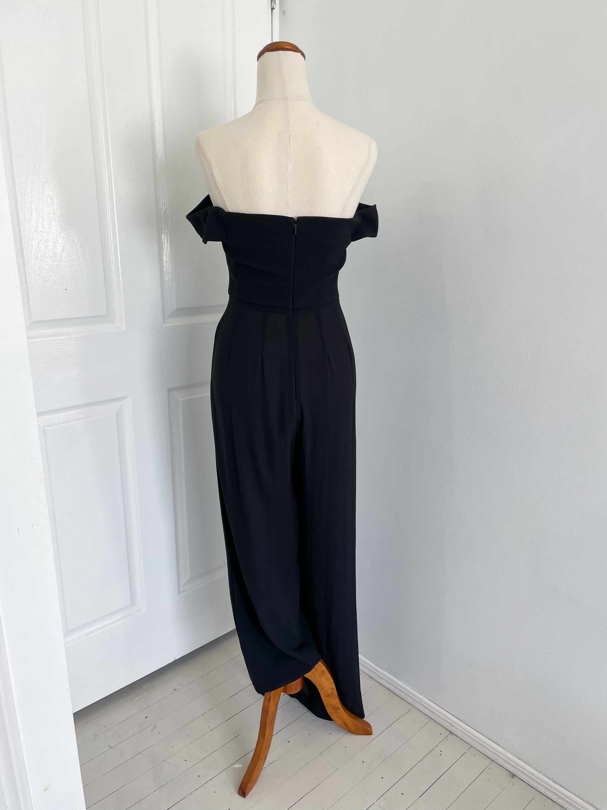 Sheike one piece pant suit or jumpsuit with off the shoulder detail and sheer see through legs