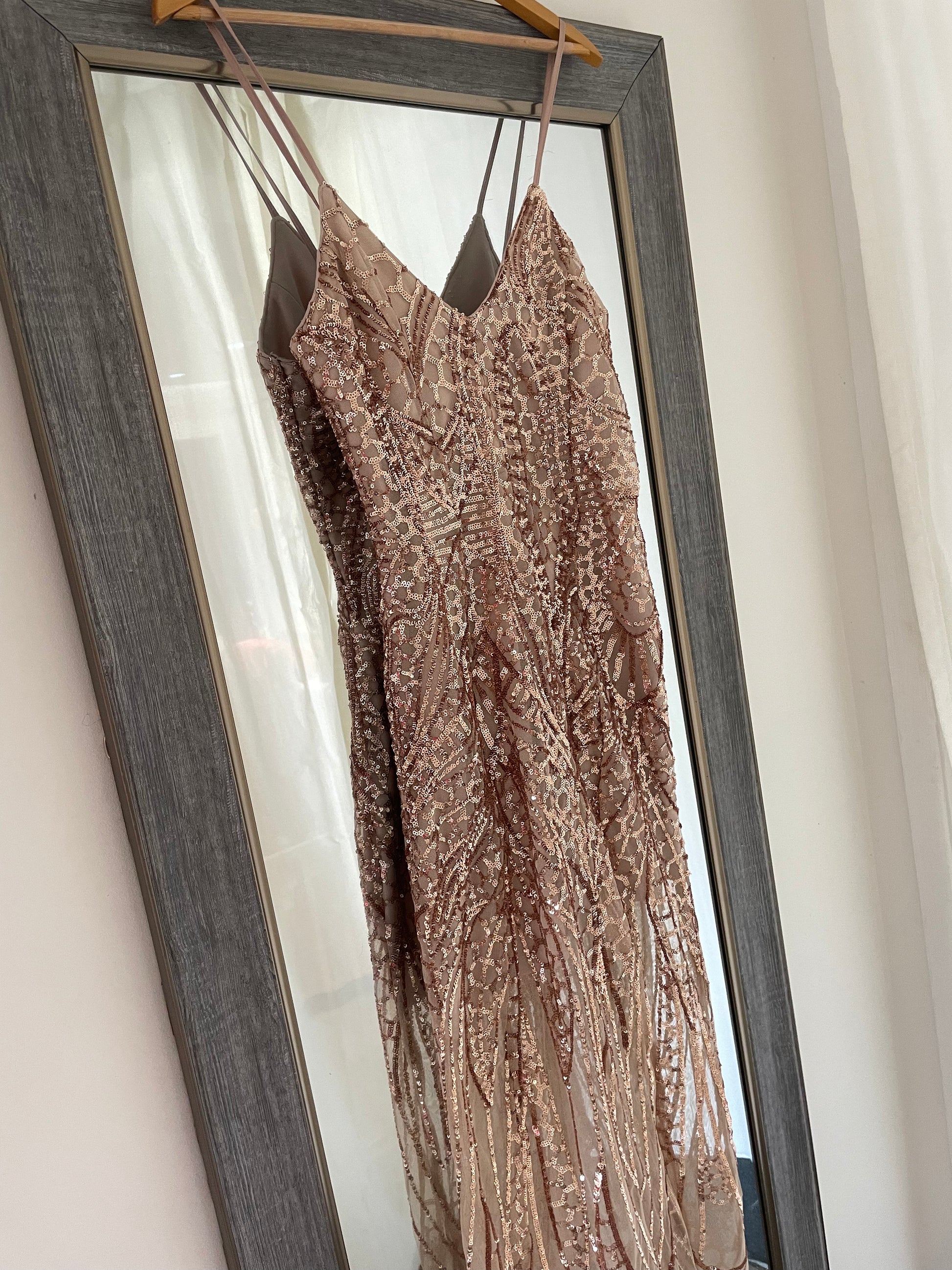 Showpo's rose gold sequin dress is the perfect mid length formal cocktail dress. Its silhouette is designed to flatter any body type, while its sequins catch the light and shine, providing a subtle sparkle to your look. Constructed from quality sequin fabric, this dress is designed to last. Add some class to any occasion with this stylish, timeless piece. Australian dress shop affordable dress